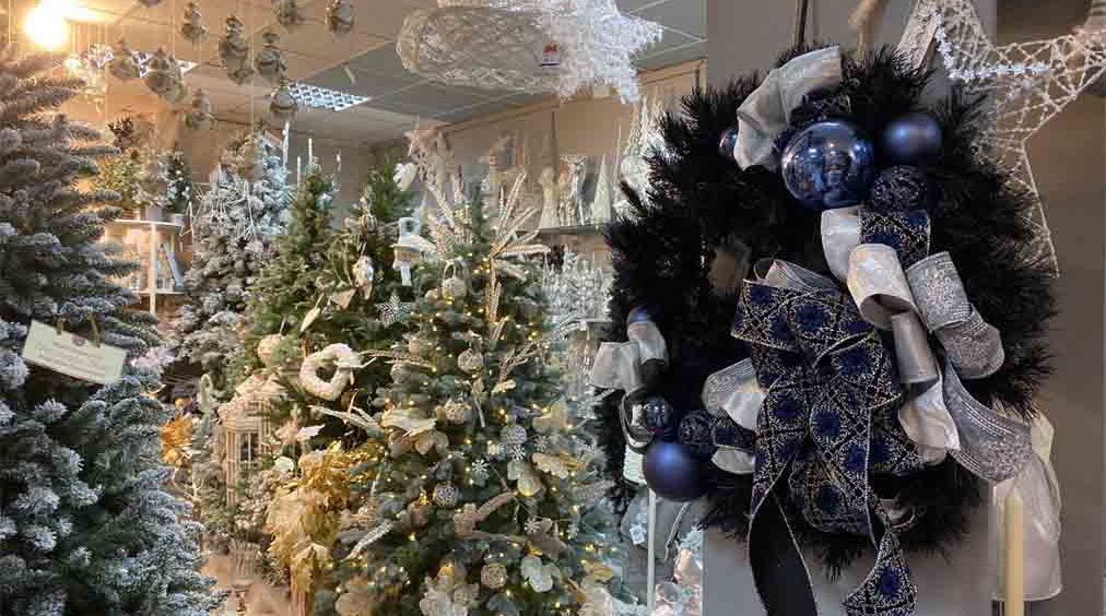 A Christmas wreath displayed in a Christmas shop