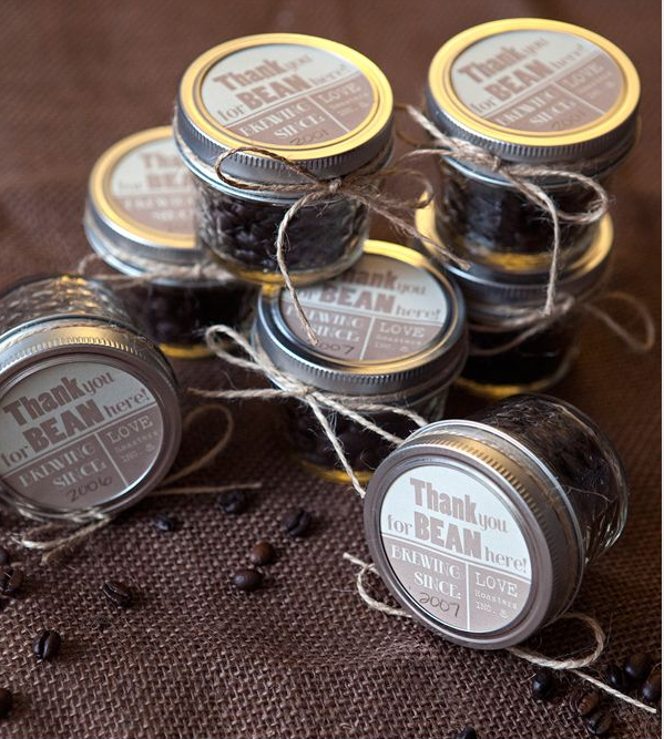 Small jars with coffee beans inside