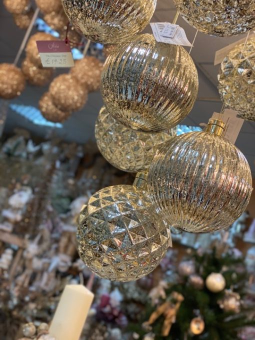 Three handing silver handcrafted baubles
